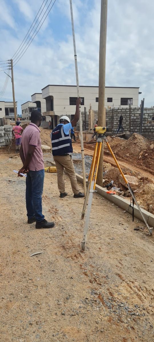 Engineers surveying a site