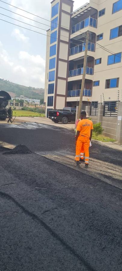 Paving crew working on a road