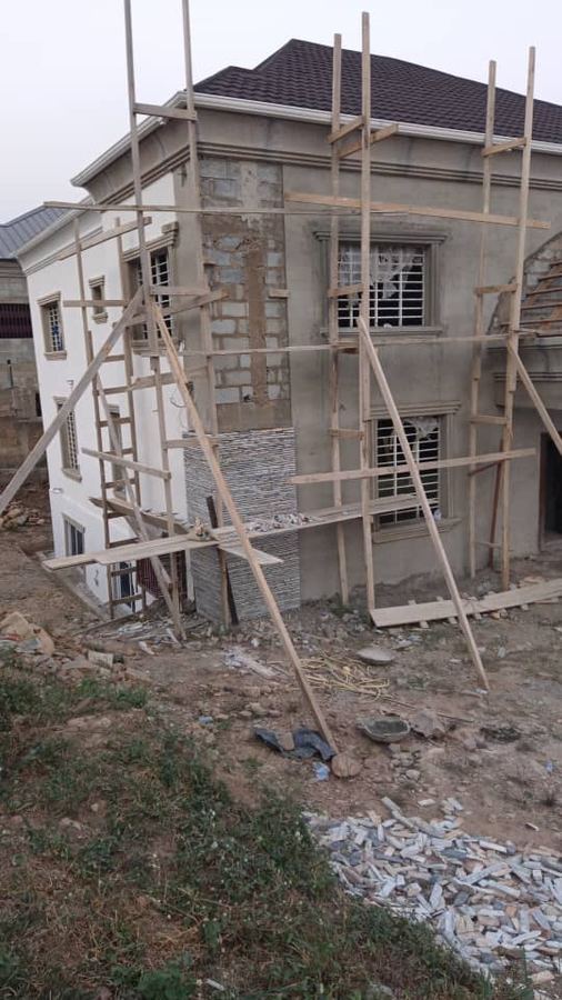 Residential building under construction with scaffolding