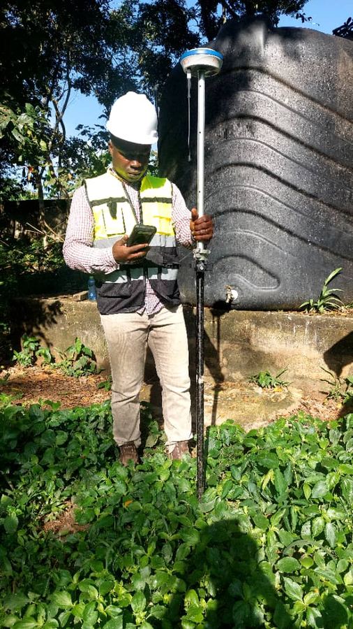 Surveyor conducting a topographical survey