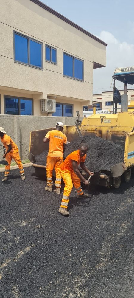 Road paving crew at work