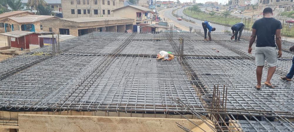 Rebar and concrete slab pour with construction crew